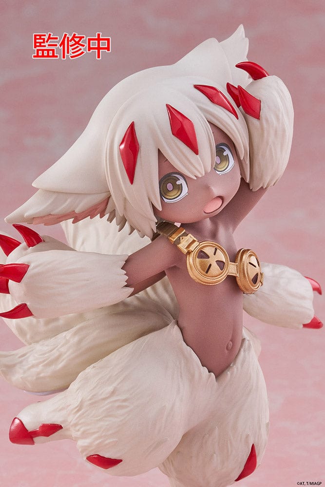 Made in Abyss Faputa Coreful Figure showcasing a dynamic pose with white fur, red markings, golden collar, and playful expression against a pink background.