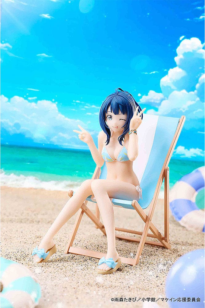 Makeine: Too Many Losing Heroines! Anna Yanami figure in a blue bikini, seated on a beach lounge chair, winking and making a peace sign.