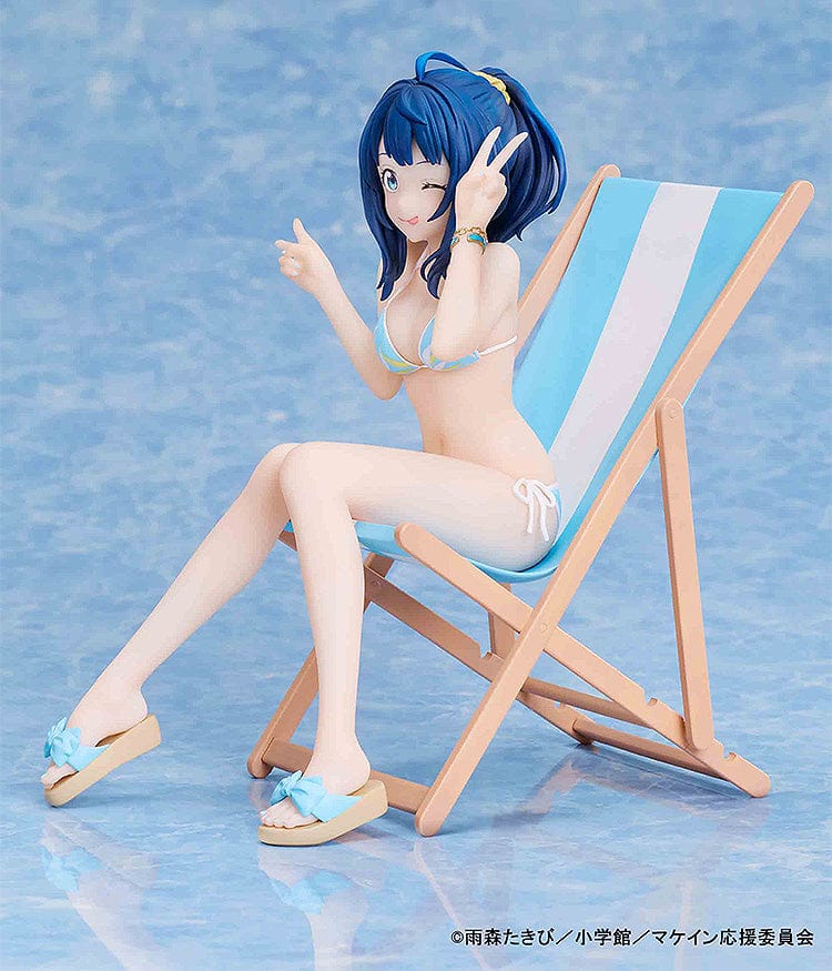 Makeine: Too Many Losing Heroines! Anna Yanami figure in a blue bikini, seated on a beach lounge chair, winking and making a peace sign.