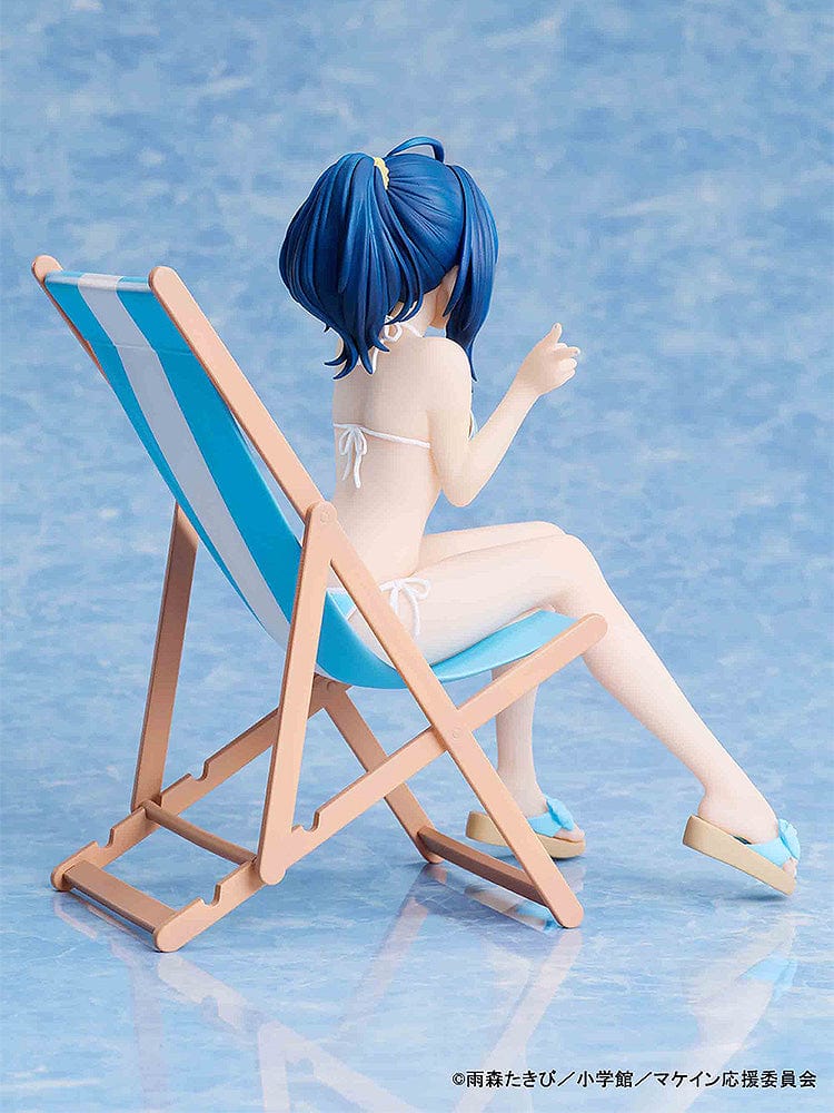 Makeine: Too Many Losing Heroines! Anna Yanami figure in a blue bikini, seated on a beach lounge chair, winking and making a peace sign.