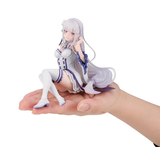 Palm-size figure of Emilia from Re:Zero Starting Life in Another World, showcasing her in a "Melty Princess" version, with her sitting gracefully in her signature white and purple dress and a serene expression, capturing her beloved character's regal and gentle essence.