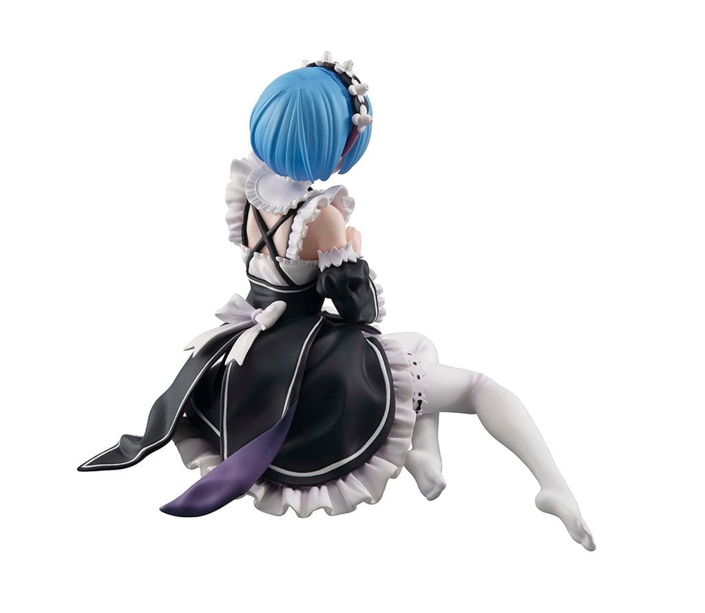 Detailed figure of Rem from Re:Zero, dressed as a maid in black and white, with blue hair and a floral headband, lying down with a gentle expression, encapsulating her Melty Princess persona in Tenohira size.