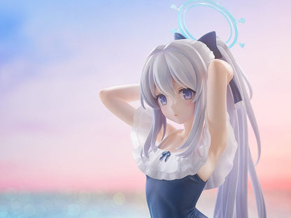 Miyako Tsukiyuki (Swimsuit Memorial Lobby Ver.) 1/7 Scale Figure from Blue Archive in a navy blue swimsuit with silver hair, adjusting her hair with a calm expression