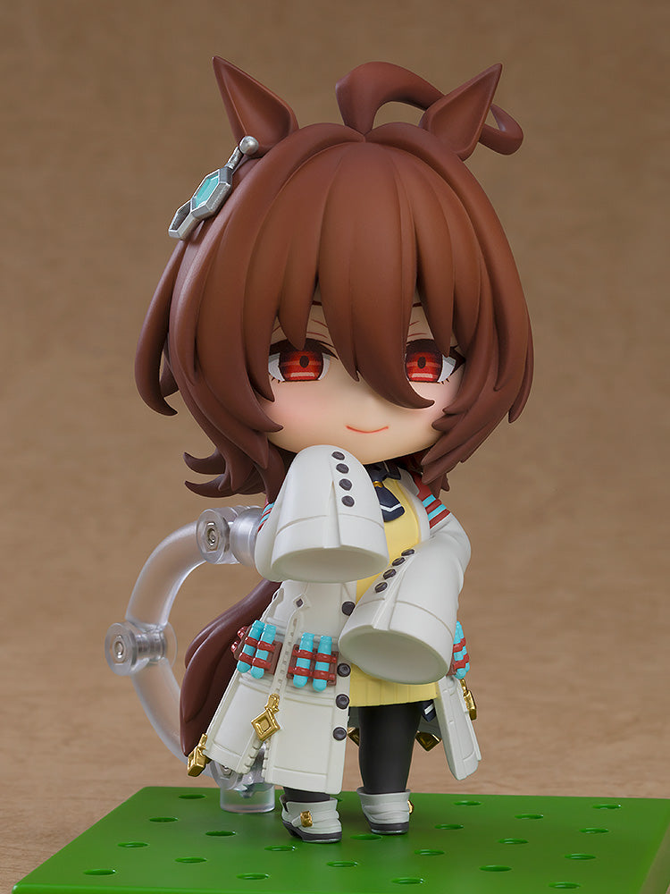 Uma Musume: Pretty Derby Nendoroid No.2512 Agnes Tachyon featuring red eyes, unique hairstyle, lab coat with colorful vials, and interchangeable accessories, perfect for fans and collectors.