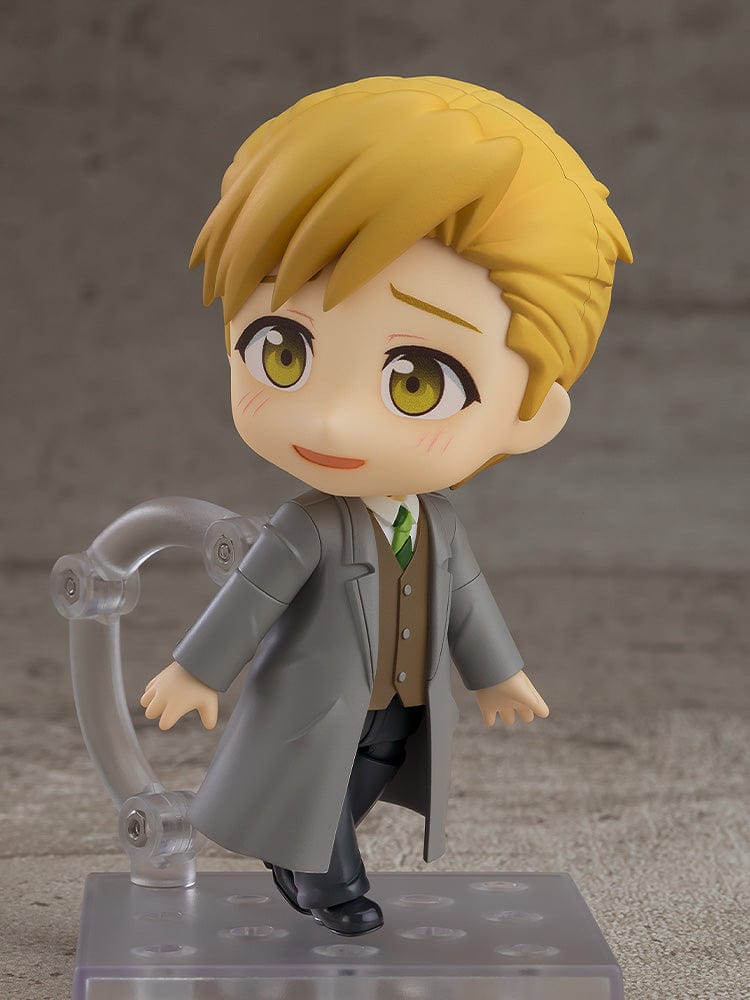 Fullmetal Alchemist: Brotherhood Nendoroid No.2624 Alphonse Elric (Final Episode Ver.) wearing a suit and overcoat, holding a briefcase.