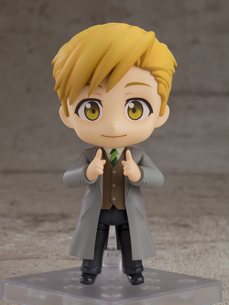 Fullmetal Alchemist: Brotherhood Nendoroid No.2624 Alphonse Elric (Final Episode Ver.) wearing a suit and overcoat, holding a briefcase.