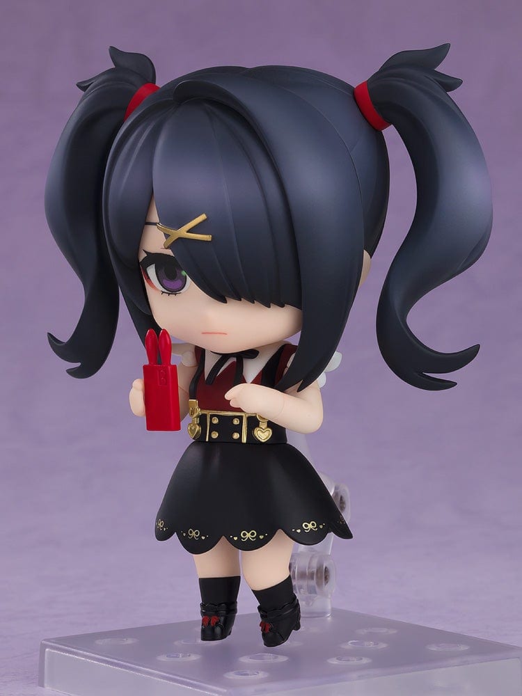 Needy Girl Overdose Nendoroid Ame, featuring her in a black dress with red bow tie and pigtails, standing with a crossed arm pose.