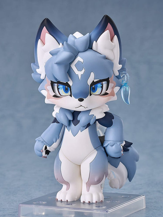 Fluffy Land Nendoroid No.2479 Caesar, depicted in a chibi style with blue and white fur, large expressive blue eyes, and distinctive black-tipped ears. This collectible figure also features adjustable joints and comes with multiple accessories for various display options.