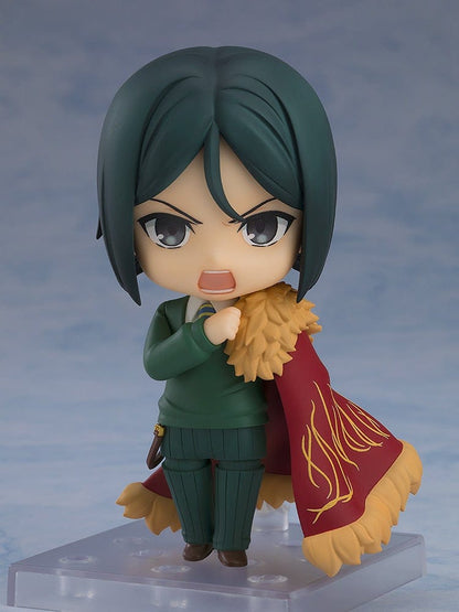 Fate/Grand Order Nendoroid No.2667 Caster/Zhuge Liang figure in a pose holding a spellbook, wearing a green suit and crimson cape with gold detailing.