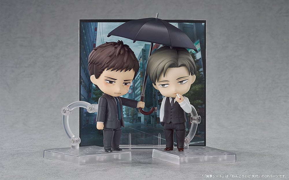 Twittering Birds Never Fly Nendoroid No.2655 Chikara Domeki figure in a dark suit with a calm expression, standing in a professional pose.