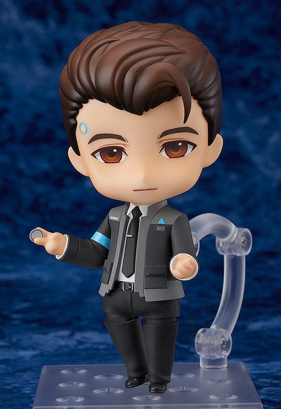 Detroit: Become Human Nendoroid Connor figure featuring the RK800 Cyberlife uniform, LED interface, and dynamic pose accessories, set against a blue background.