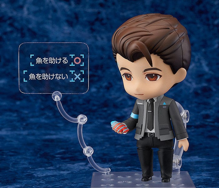 Detroit: Become Human Nendoroid Connor figure featuring the RK800 Cyberlife uniform, LED interface, and dynamic pose accessories, set against a blue background.