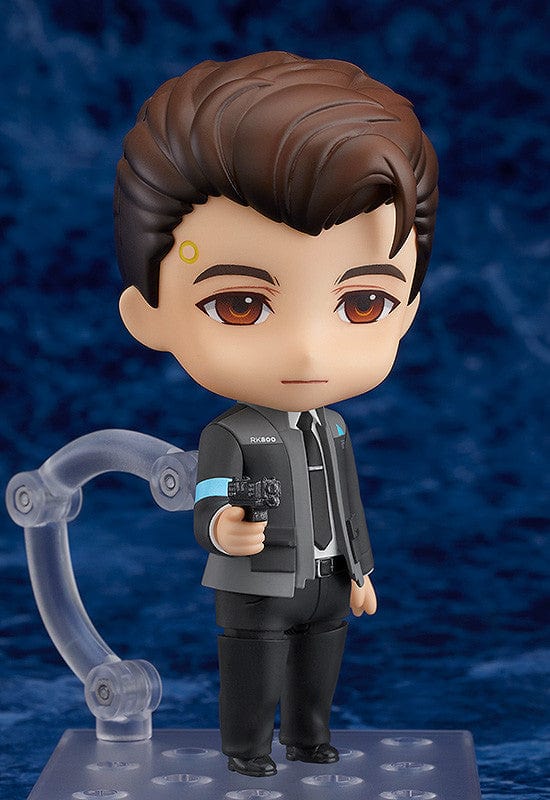 Detroit: Become Human Nendoroid Connor figure featuring the RK800 Cyberlife uniform, LED interface, and dynamic pose accessories, set against a blue background.