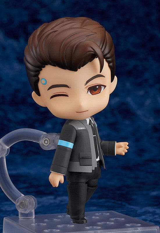 Detroit: Become Human Nendoroid Connor figure featuring the RK800 Cyberlife uniform, LED interface, and dynamic pose accessories, set against a blue background.