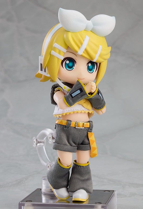 Vocaloid Nendoroid Doll Kagamine Rin (Reissue) featuring a posable body, yellow and gray outfit, white bow, and cheerful expression.