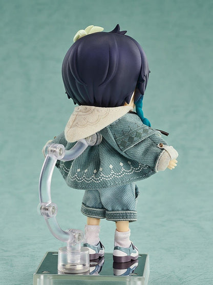 Genshin Impact Nendoroid Doll Venti (Blue Ballad Ver.) featuring a denim-style outfit, teal braids, and a floral hair accessory in a playful pose.