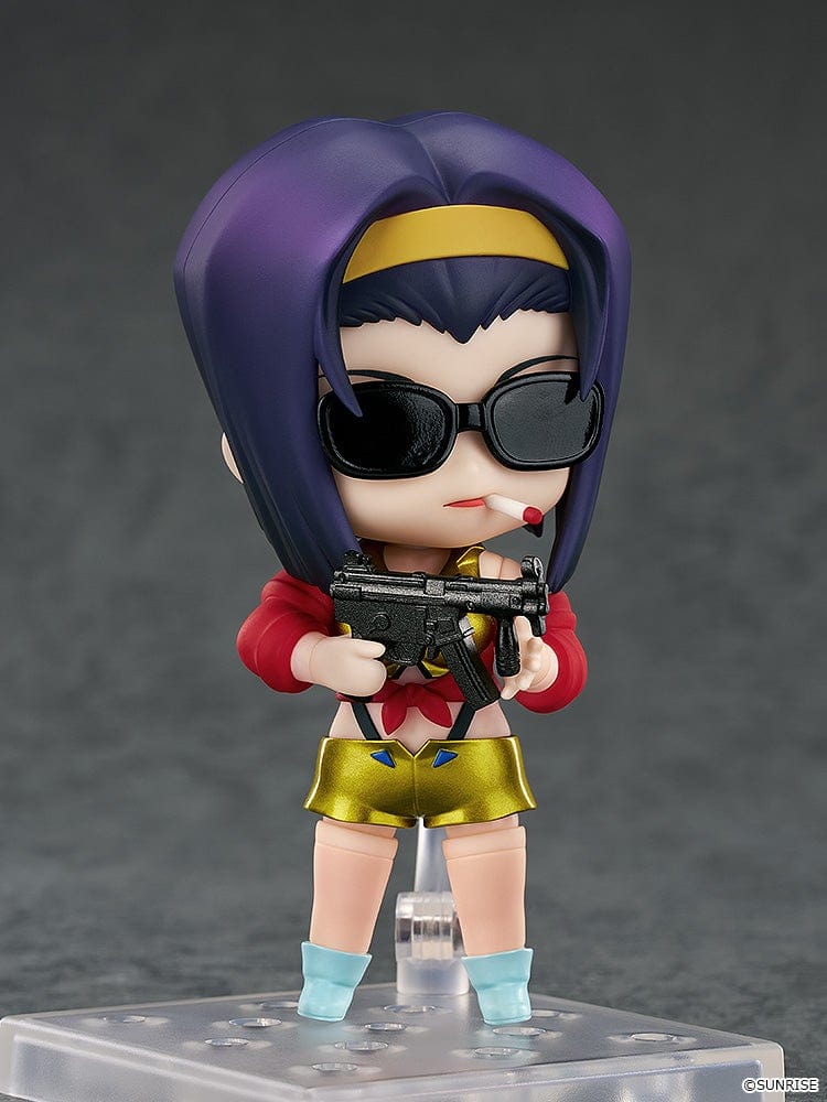 Faye Valentine Nendoroid from Cowboy Bebop in her yellow and red iconic outfit with a confident pose and green eyes.