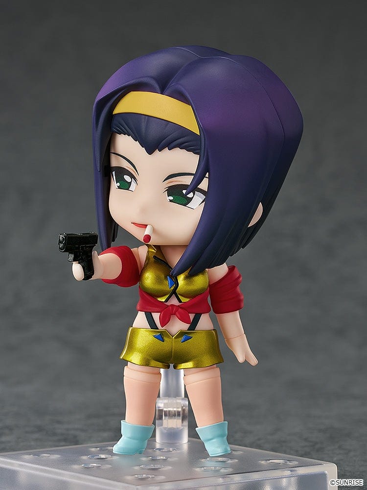 Faye Valentine Nendoroid from Cowboy Bebop in her yellow and red iconic outfit with a confident pose and green eyes.