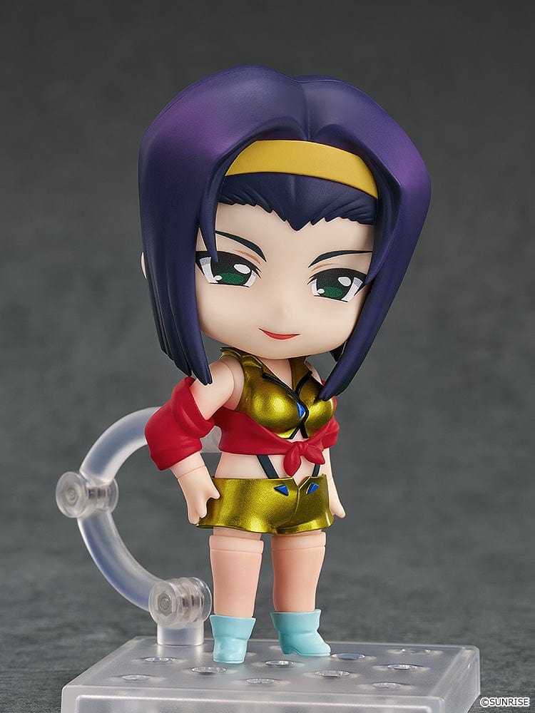 Faye Valentine Nendoroid from Cowboy Bebop in her yellow and red iconic outfit with a confident pose and green eyes.