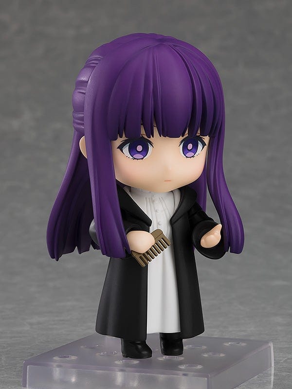 Frieren: Beyond Journey's End Nendoroid No.2368 Fern reissue figure featuring purple hair, black cloak, and iconic staff on a display base.