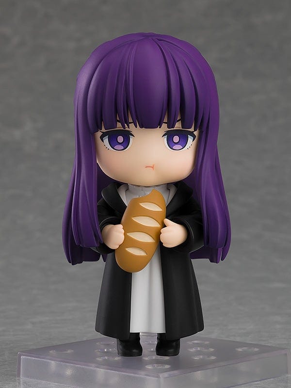 Frieren: Beyond Journey's End Nendoroid No.2368 Fern reissue figure featuring purple hair, black cloak, and iconic staff on a display base.