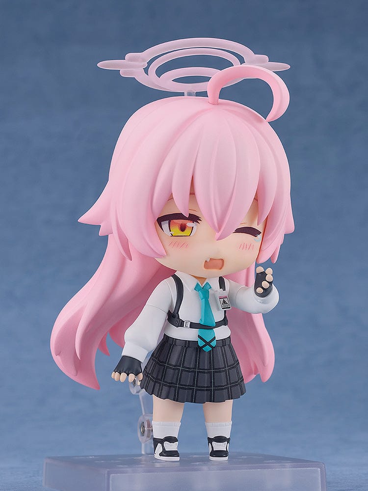 Blue Archive Nendoroid No.2461 Hoshino Takanashi showcases the character in her school uniform with a tactical twist, wielding a sniper rifle. The figure includes characteristic pink hair styled with a futuristic halo, conveying both her innocent appearance and battle-ready nature.