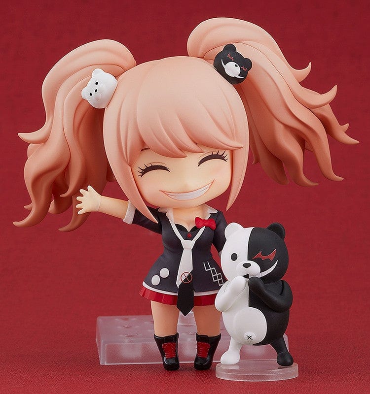 Danganronpa 1.2 Reload Nendoroid No.1398 Junko Enoshima (Reissue) with Monokuma, twin-tail hairstyle, and detailed school uniform on a red background.