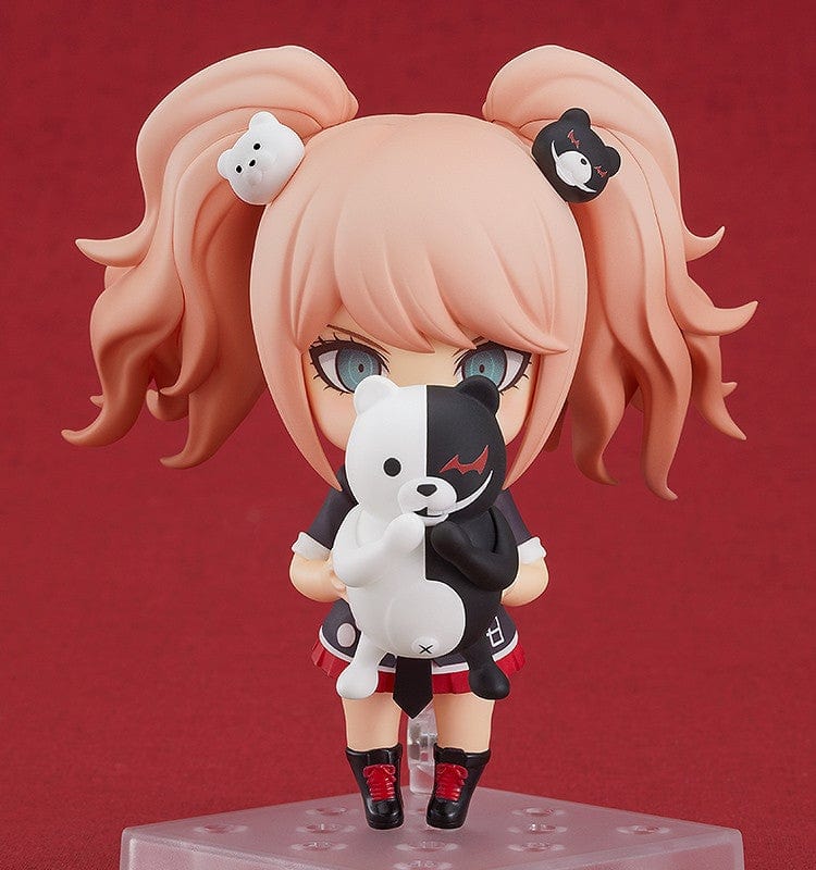 Danganronpa 1.2 Reload Nendoroid No.1398 Junko Enoshima (Reissue) with Monokuma, twin-tail hairstyle, and detailed school uniform on a red background.