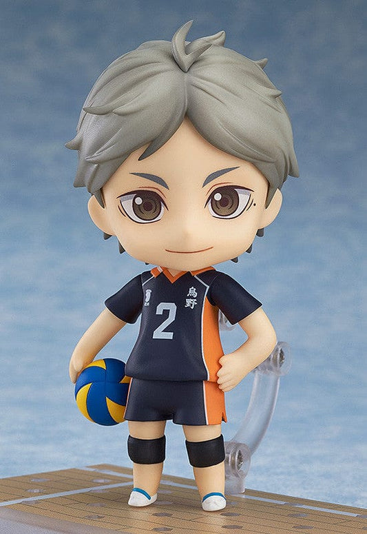 Haikyu!! Nendoroid Koshi Sugawara (3rd-run) in Karasuno team uniform, with a number 2 jersey, holding a volleyball, and a friendly expression set against a volleyball court backdrop.