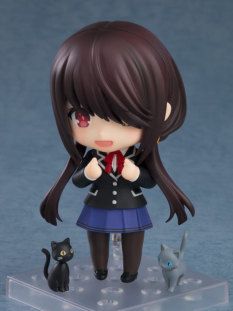 Nendoroid figure No.2455 of Kurumi Tokisaki from Date a Live, dressed in her school uniform, with a coy expression, detailed brown hair, and her signature clock eye, encapsulating her unique blend of schoolgirl innocence and timeless beauty.