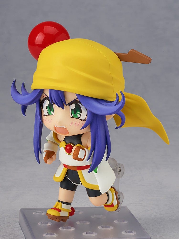 Saber Marionette J Nendoroid Lime featuring her iconic yellow hat, vibrant outfit, and playful pose with detailed craftsmanship.