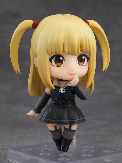 Death Note Nendoroid Misa Amane 2.0 figure featuring a black gothic dress, twin ponytails, and a Death Note accessory, posed against a gray background.