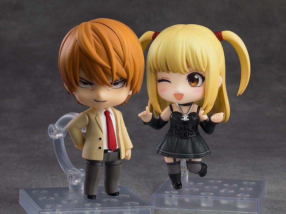 Death Note Nendoroid Misa Amane 2.0 figure featuring a black gothic dress, twin ponytails, and a Death Note accessory, posed against a gray background.