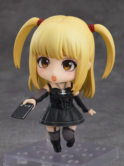 Death Note Nendoroid Misa Amane 2.0 figure featuring a black gothic dress, twin ponytails, and a Death Note accessory, posed against a gray background.