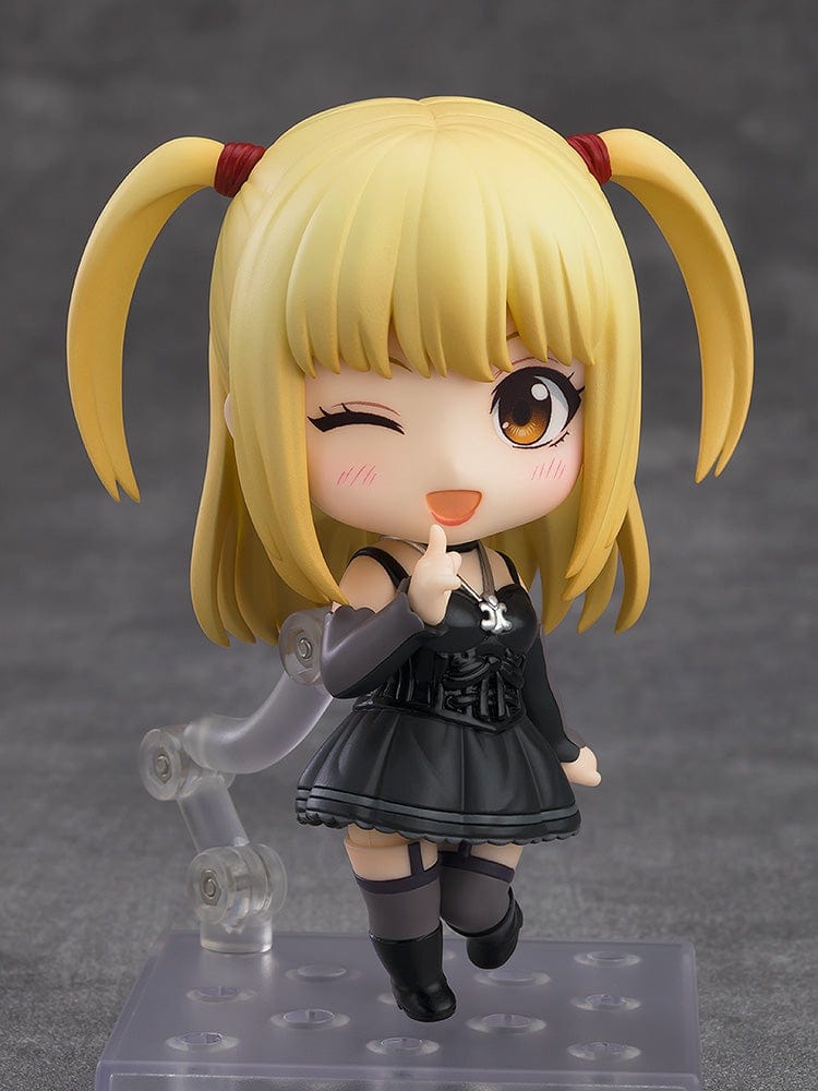 Death Note Nendoroid Misa Amane 2.0 figure featuring a black gothic dress, twin ponytails, and a Death Note accessory, posed against a gray background.