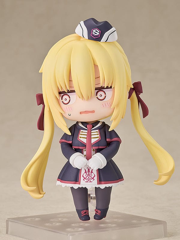Nendoroid figure of Nanami Arihara from Riddle Joker, featuring multiple expressions and wearing a school uniform with a hat, complete with a chocolate bar accessory, on a clear plastic base.