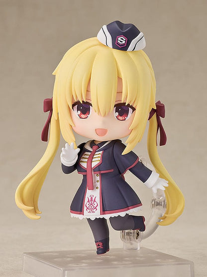 Nendoroid figure of Nanami Arihara from Riddle Joker, featuring multiple expressions and wearing a school uniform with a hat, complete with a chocolate bar accessory, on a clear plastic base.