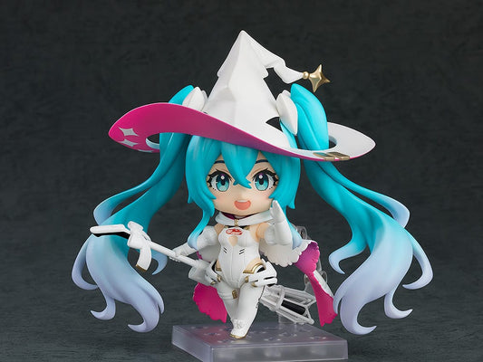 Hatsune Miku GT Project Nendoroid No.2477 Racing Miku (2024 Ver.) - Animated and colorful Nendoroid figure of Racing Miku dressed in a futuristic white and pink racing outfit with a magical witch-like hat, complete with a broom and flag, embodying both racing and magical themes.