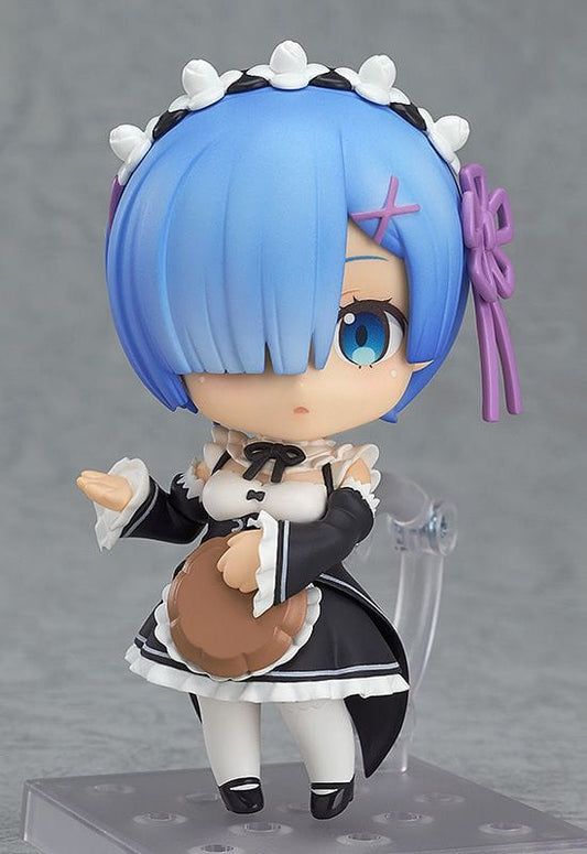 Re:Zero Nendoroid No.663 Rem figure in classic black-and-white maid outfit, holding tray, with blue hair and serious expression in chibi form

