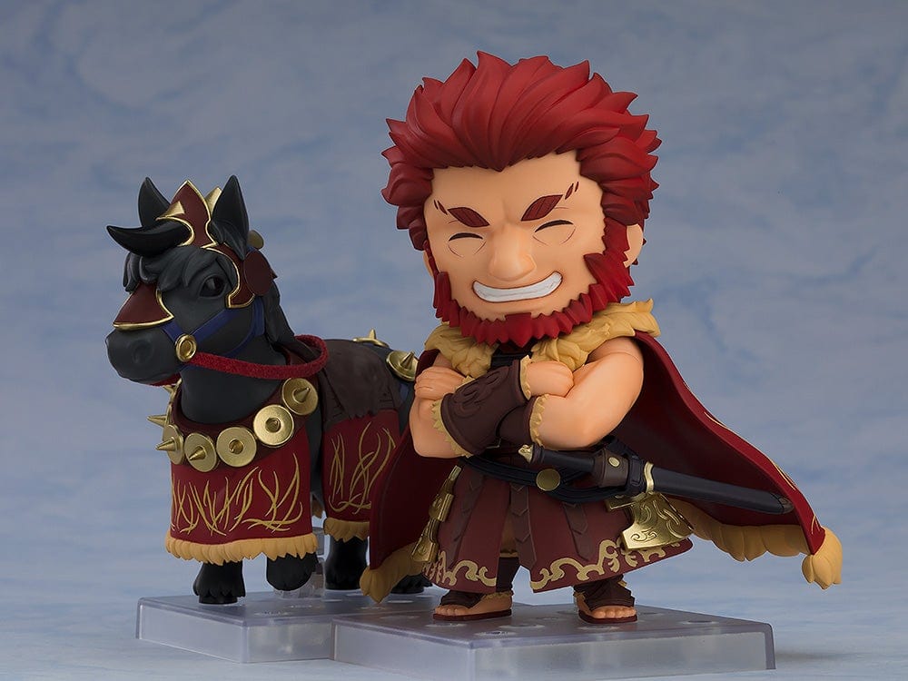 Fate/Grand Order Nendoroid No.2666-DX Rider/Iskandar figure in a heroic pose on his horse, showcasing his crimson cape and detailed armor.