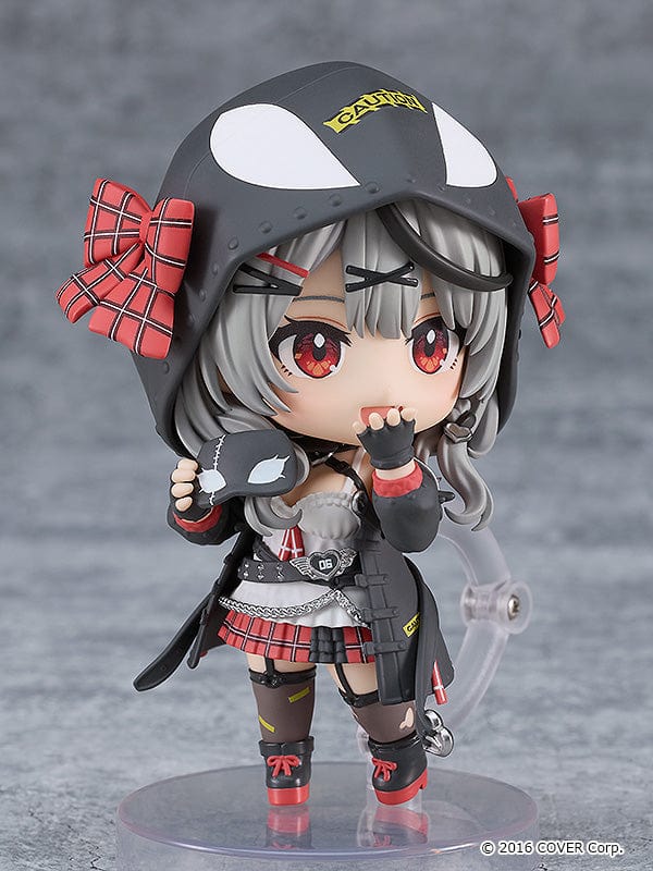 Cute Nendoroid figure of Sakamata Chloe from Hololive Production, donning her iconic shark helmet and edgy fashion, with a wide smile that perfectly embodies her bubbly and mischievous personality.