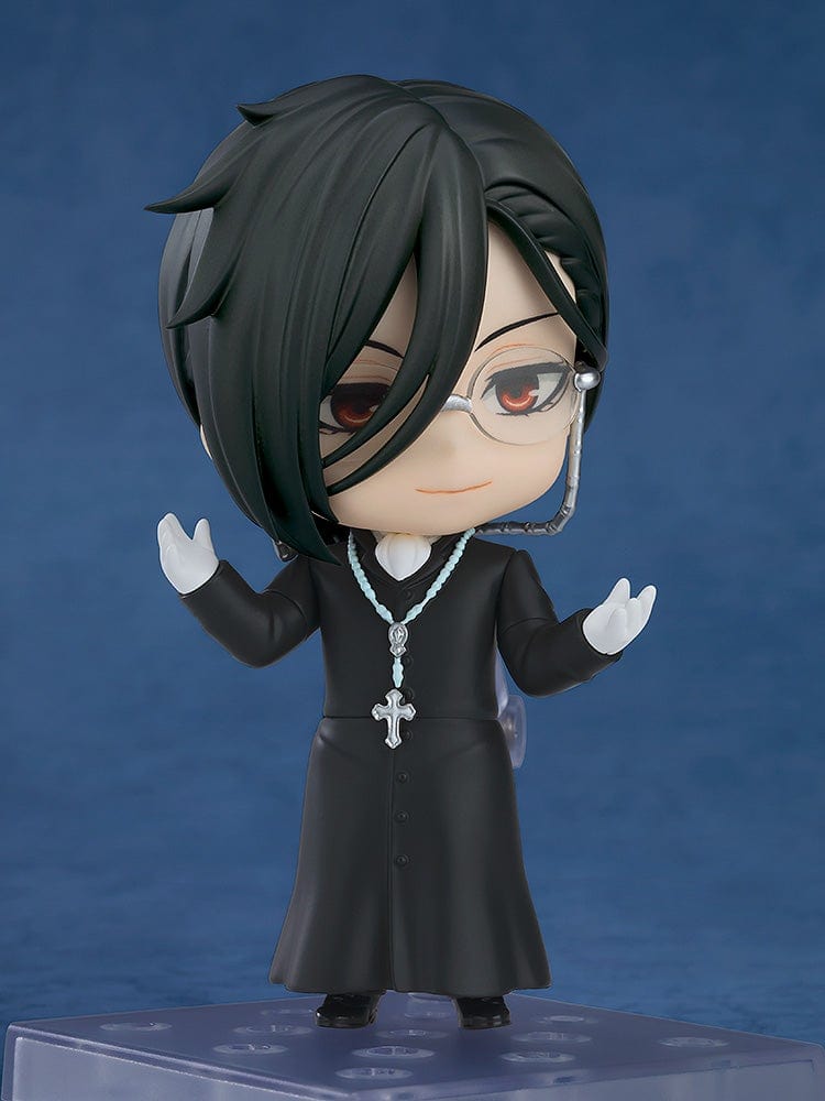 Black Butler Nendoroid No.2670 Sebastian Michaelis (Sapphire Owl Ver.) figure featuring detailed priest-inspired attire, a rosary necklace, and glasses, posed against a blue background.