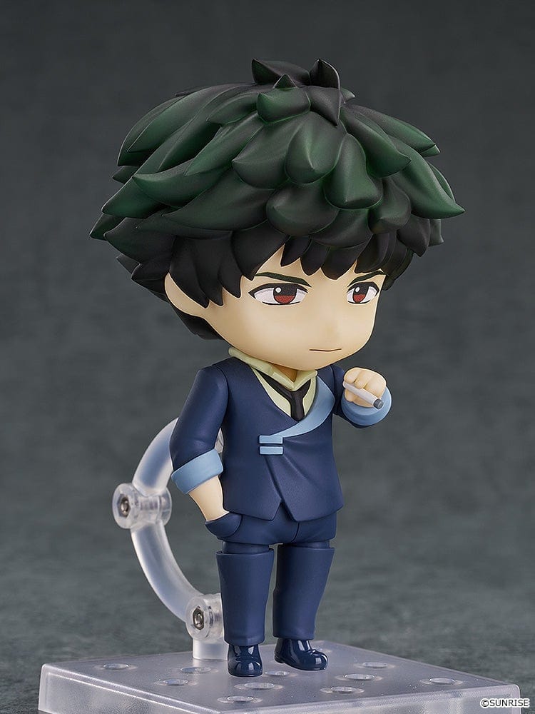 Cowboy Bebop Nendoroid No.2651 Spike Spiegel in his navy suit, holding his pistol, with green tousled hair and red eyes.