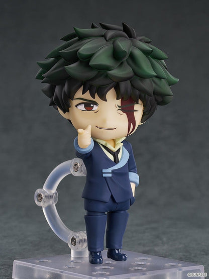 Cowboy Bebop Nendoroid No.2651 Spike Spiegel in his navy suit, holding his pistol, with green tousled hair and red eyes.