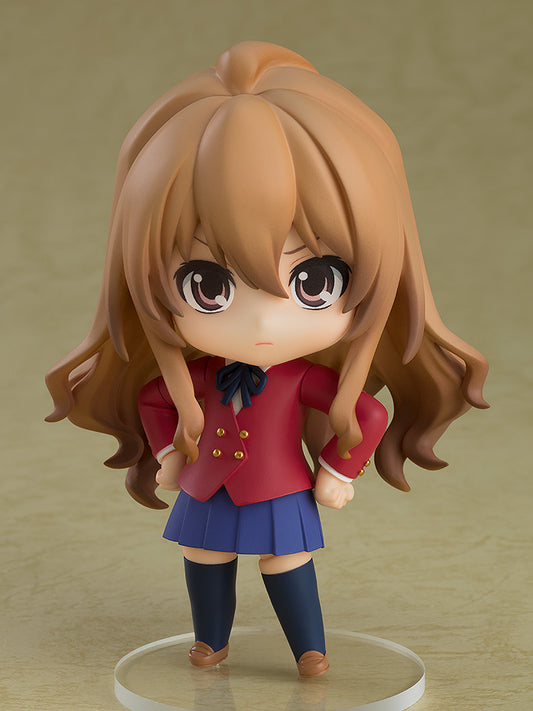 Toradora! Nendoroid No.2523 Taiga Aisaka 2.0 featuring classic school uniform, fierce expression, and interchangeable parts, perfect for fans and collectors.