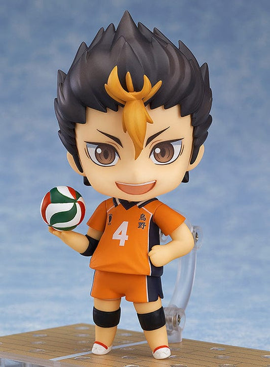Haikyu!! Nendoroid Yu Nishinoya (4th-run) in action, Karasuno's number 4, with iconic black and orange hair, ready for a save with volleyball in hand.