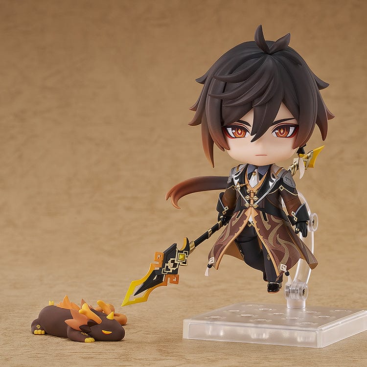 Genshin Impact Nendoroid No.2582 Zhongli featuring the Geo Archon with his signature spear and mini Geo construct in a chibi-style figure.