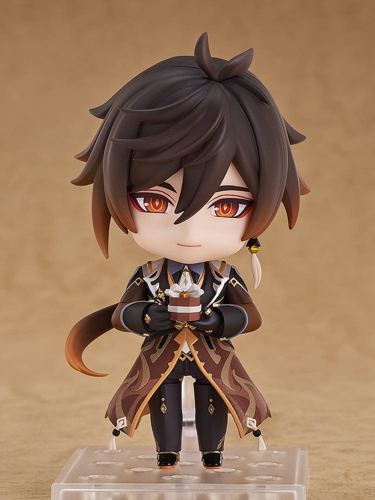 Genshin Impact Nendoroid No.2582 Zhongli featuring the Geo Archon with his signature spear and mini Geo construct in a chibi-style figure.