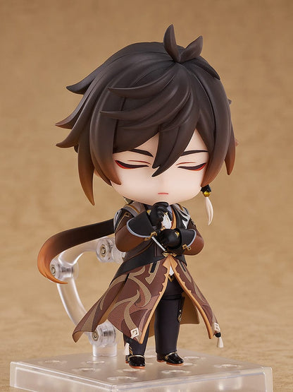 Genshin Impact Nendoroid No.2582 Zhongli featuring the Geo Archon with his signature spear and mini Geo construct in a chibi-style figure.