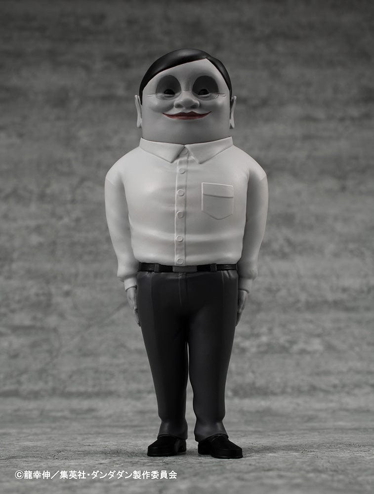 Dandadan Occultic Sofubi Collection Alien Serpo Figure, featuring a monochrome design with eerie smile and minimalist outfit, crafted in soft vinyl.